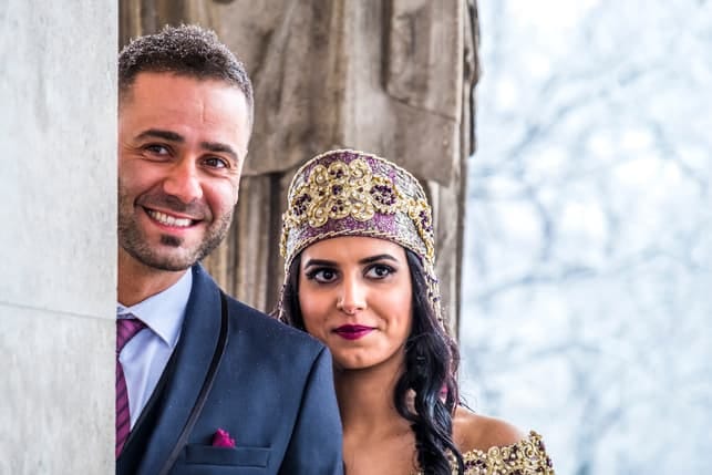 a couple in traditional turkish outfits