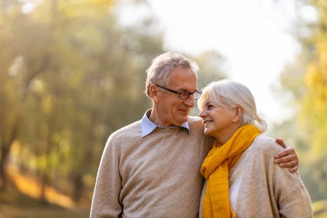 a senior couple having a walk together