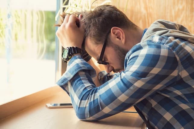 a young man praying