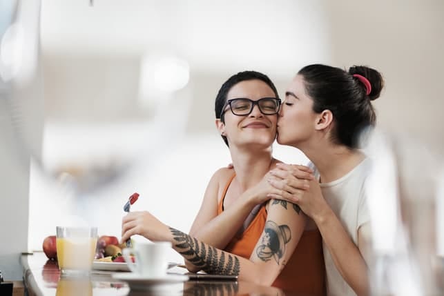 a lesbian couple having breakfast together