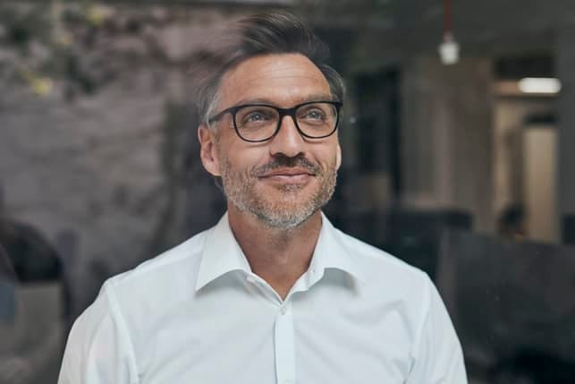 a portrait of a happy middle-aged man
